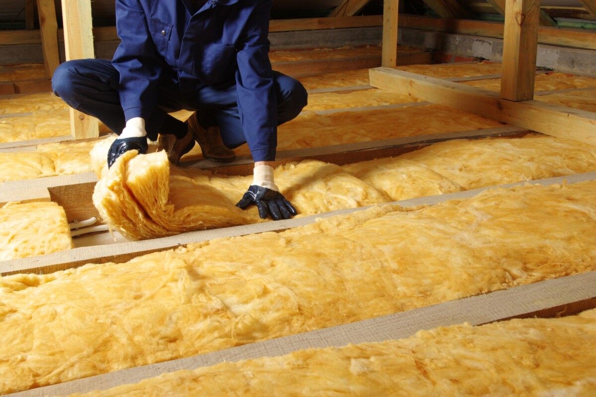 Man,Installing,Thermal,Insulation,Layer,Under,The,Roof,,Using,Mineral Man,Installing,Thermal,Insulation,Layer,Under,The,Roof,,Using,Mineral